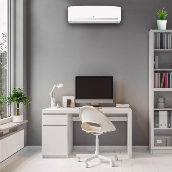Home office air conditioning installed in UK house, quiet wall mounted cooling and heating system in workspace, energy efficient AC unit for productivity and comfortable working environment all year round www.airomax.co.uk